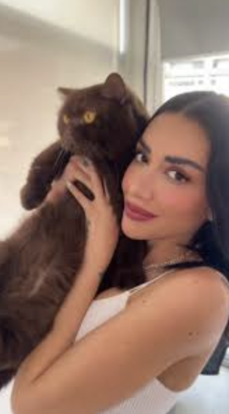 Karime y su gato Norris
