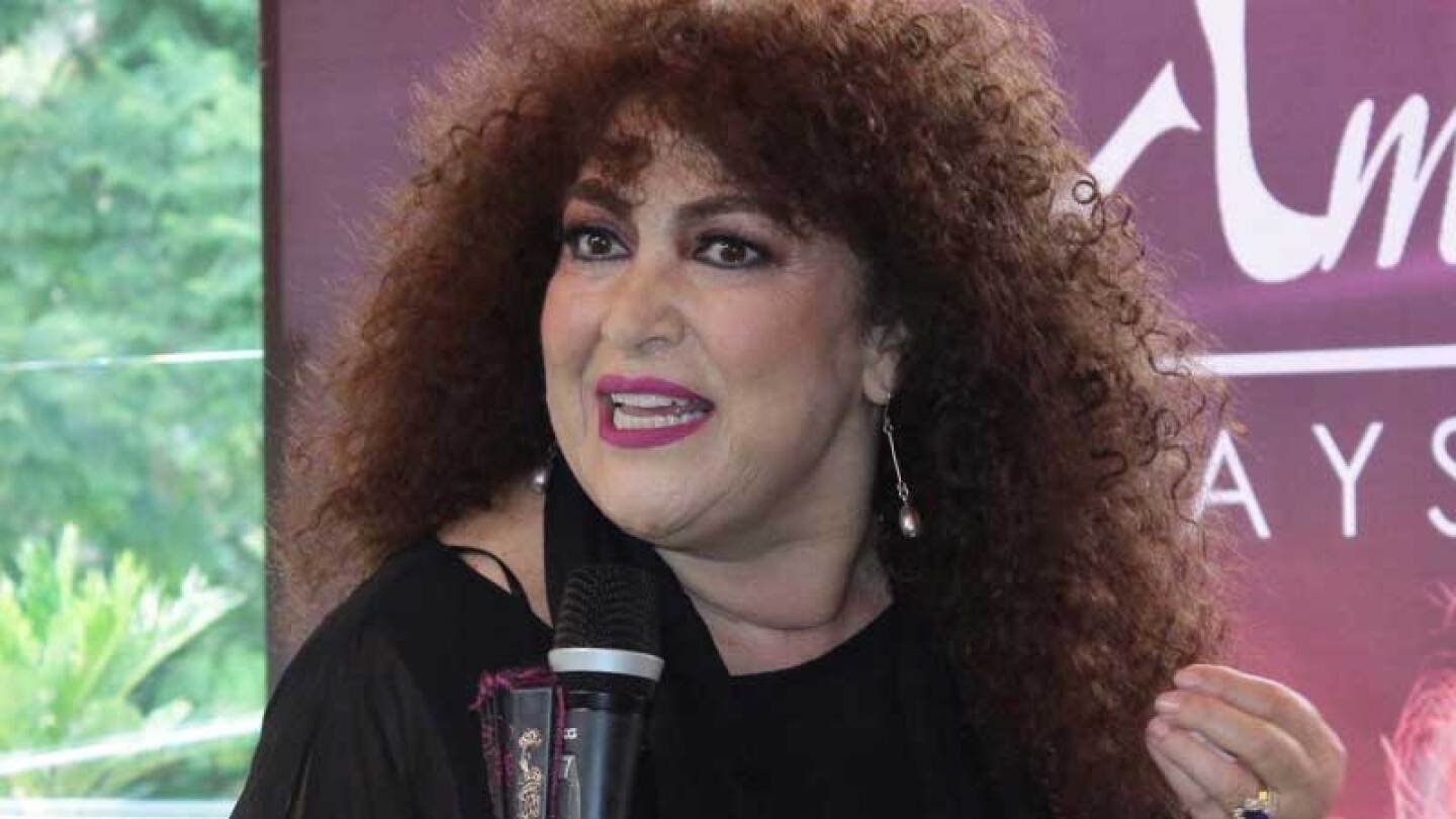 amanda miguel nuevo look cabello corto canas foto